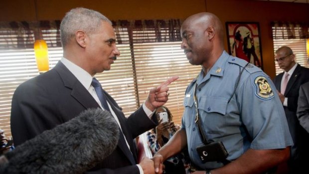 US Attorney-General Eric Holder with Captain Ron Johnson of the Missouri State Highway Patrol.