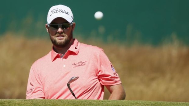 Eyes on the ball: Marc Leishman during his opening round at the British Open.