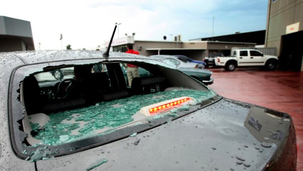 A hail-damaged car in Perth. <i>Picture: Steve Ferrier</i>
