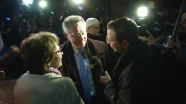 UN envoy to Ukraine Robert Serry (centre) is reported to be aborting his mission to Crimea after the confrontation with gunmen.