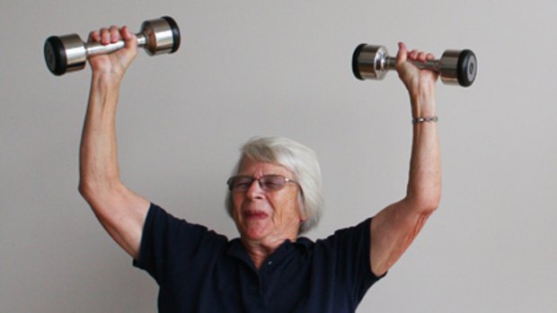 Up in arms... Daphne Degotardi lifts weights during a class held as part of the Strong Seniors program at Leichhardt Aquatic Centre.