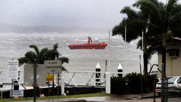 Cooktown battered: Waves build in North Queensland.