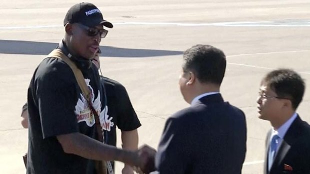 Dennis Rodman, left, was greeted by Son Kwang Ho, vice-chairman of North Korea's Olympic Committee, on his recent trip.