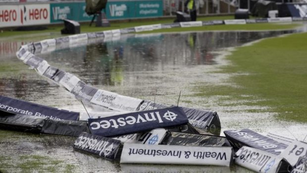 The water-logged boundary area at Old Trafford after rain on day two of the fourth Test forced an early end to play.