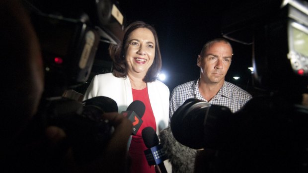 Labor leader Annastacia Palaszczuk walks out of the political darkness, and into the spotlight as likely new Premier.