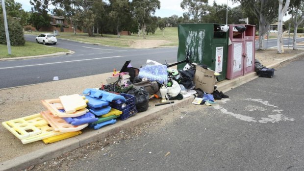 Rubbish dumped at the charity bins at the Cooleman Court shopping centre in Weston Creek.