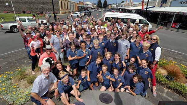 Happy days ... some of the happy residents of Port Fairy celebrate the town's prestigious international award as most liveable town.