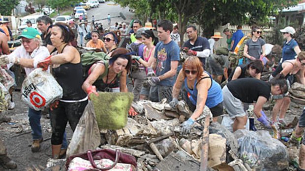 Nearly 1000 trucks of rubbish a day were being carted to landfill following the flood.