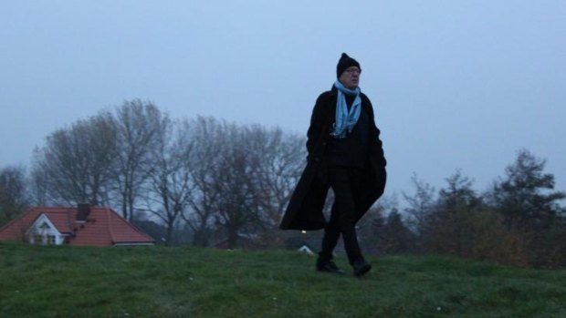 Geoffrey Rush walks through the grounds of St Nikolaus Church in Brokdorf, Germany, in <i>Who Do You Think You Are</i>.