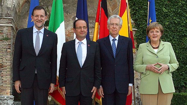 From left to right... Spanish Prime Minister Mariano Rajoy, French President Francois Hollande, Italian Prime Minister Mario Monti and German Chancellor Angela Merkel at a meeting in Rome, Italy.