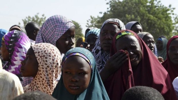 Trying to create an Islamic state ... A woman from Gwoza, Borno State, displaced by the violence caused by the Boko Haram insurgency, weeps at a refugee camp in Mararaba Madagali, Adamawa State. 