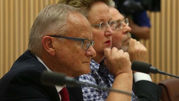 Conflict of interest: Tony Shepherd appearing with fellow commissioners before a Senate Committee in Canberra.