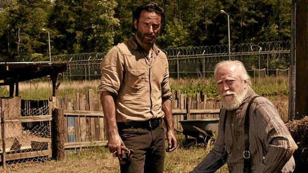 Eats: Rick (Andrew Lincoln) and farmer Hershel (Scott Wilson) keep the food coming in <i>The Walking Dead</i>.