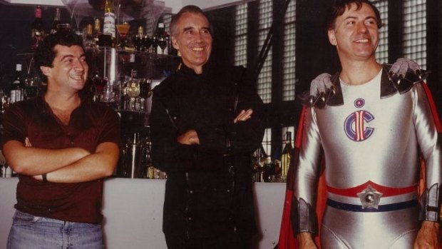 Philippe Mora, Christopher Lee and Alan Arkin on the set of <i>The Return of Captain Invincible</i>.