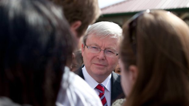 'In the tent' ... Kevin Rudd campaigns at a high school in his electorate of Griffith.