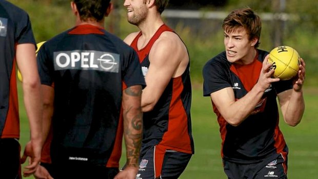 Potential Melbourne father-son draftee Jack Viney (right) trains with the Demons.