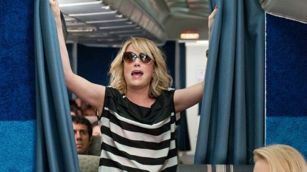 Fasten your seatbelts  ... Kristen Wiig, who co-wrote Bridesmaids with Annie Mumolo, stars as Annie, who morphs from bride's best friend to delinquent maid of honour.