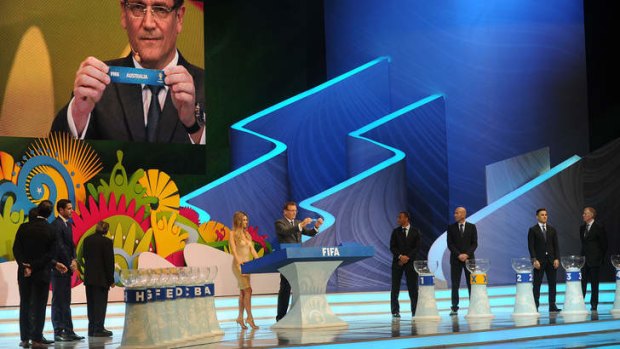 Fateful moment: FIFA Secretary General Jerome Valcke displays the Australian ticket during the World Cup draw in Costa do Sauipe, Brazil.