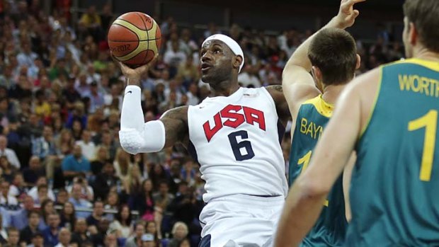 Up against the Boomers ... USA star  Lebron James drives to the basket