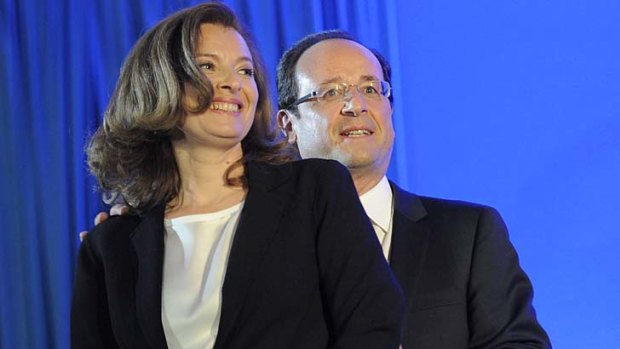 Heading to the Elysee Palace ... Francois Hollande and Valerie Trierweiler.