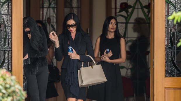 Mourners at the funeral for Pasquale Barbaro.