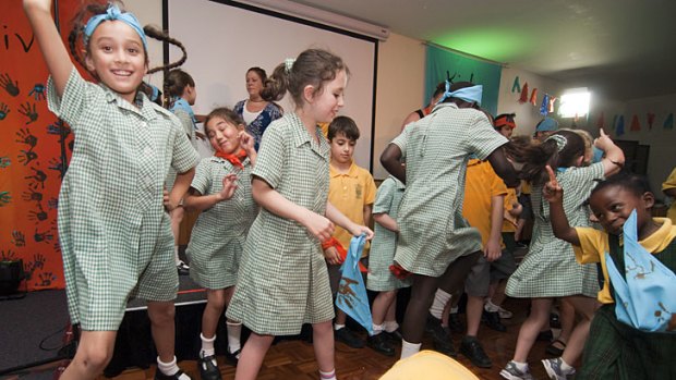 Children get into the groove at a Kids Thrive performance.