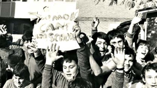 Punishing blow  ... students celebrate the handing out of ``ban the cane'' pamphlets at Canterbury Boys High School in 1981.
