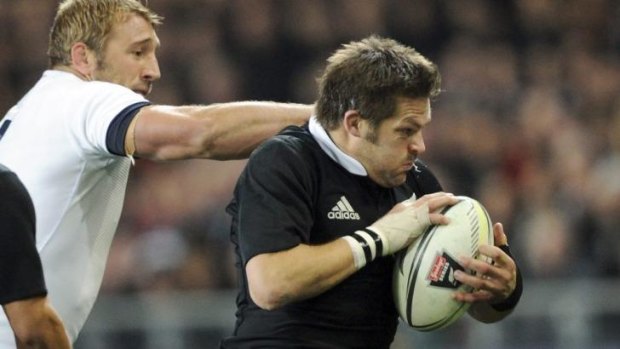 On the run: Richie McCaw during the recent series against England.