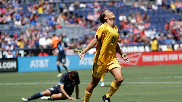 Unstoppable: Australia's Sam Kerr celebrates her third goal against Japan.