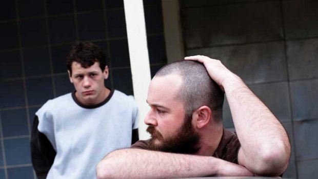 Chilling quiet: Jamie (Lucas Pittaway, left) waits for his surrogate father John Bunting (Daniel Henshall) to tell him their plans for the day in the harrowing crime-movie masterpiece Snowtown.