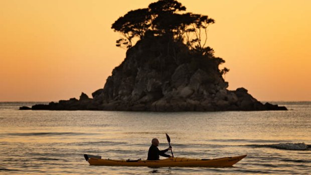 Paddle power: Kayaking at sunrise.