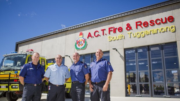 Senior firefighter Mitch Brennan, station officer Paul Thorpe, senior firefighters Mark Callaway, and Gavin Kaylock at the official opening of the new ACT Fire and Rescue station at South Tuggeranong. 

