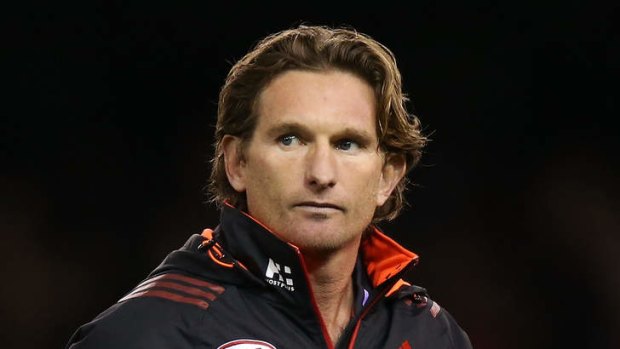 Under pressure ... A pensive James Hird watches the Essendon Bombers play the Brisbane Lions at Melbourne's Ethiad Stadium in May, 2013.