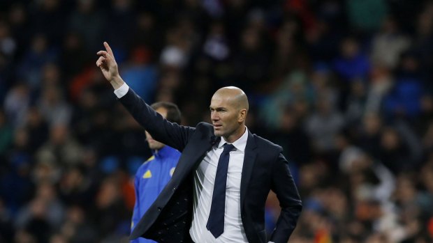 Winning start: Real Madrid's new head coach Zinedine Zidane gives instructions from the side line during his side's victory against Deportivo La Coruna.