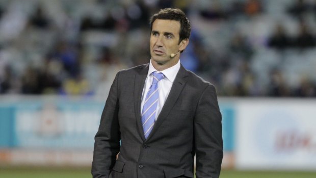 Helping hand: Andrew Johns during his commentary duties for Channel Nine.