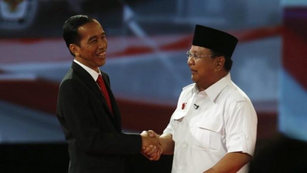 Joko  Widodo, left, with his opponent  in the presidential election Prabowo Subianto.