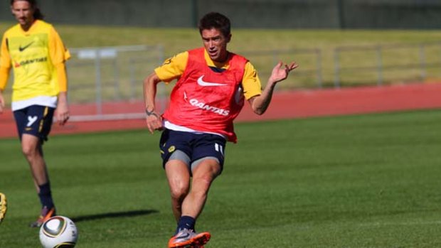 Ready to go ... Harry Kewell trains with the Socceroos.
