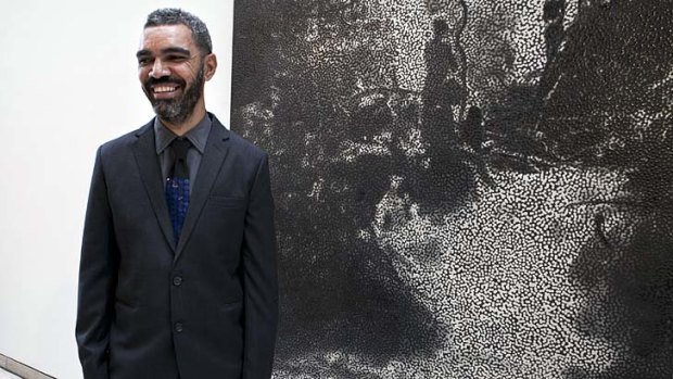 History lesson: Daniel Boyd, who explores colonisation in his art, and his Bulgari Arts Prize winning artwork <i>Untitled</i> 2014 at the Art Gallery of NSW.