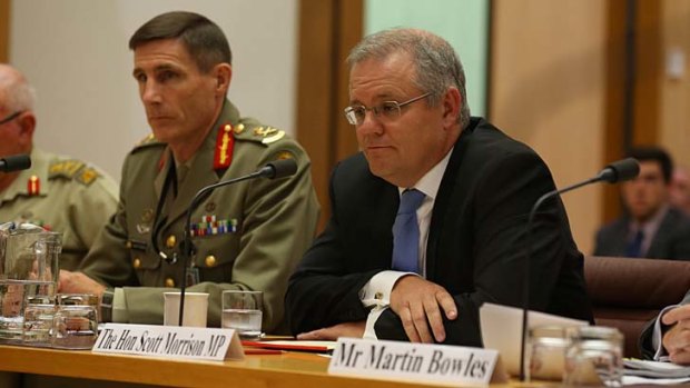 Under pressure: Scott Morrison and Lieutenant General Angus Campbell face the Senate committee in Canberra.