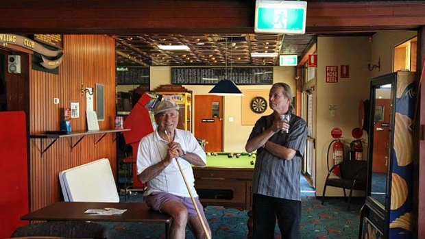 The nearby bowling club, of which Lorenzo Pergolizzi, below left, is a member, earns revenue from 20 machines.