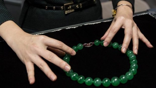 The jadeite "Hutton-Mdivani Necklace", with 27 beads, sold for $13.9 million in Hong Kong.