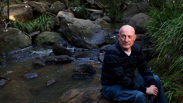Let down: Ken Hall, at the Georges River near his home, believes BHP should act quicker.