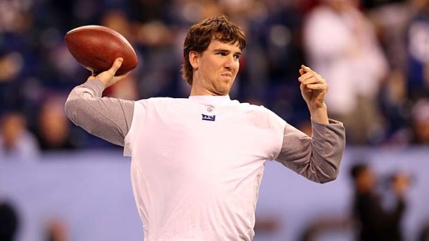 Star man ... Eli Manning practises ahead of the Super Bowl.