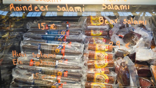  Reindeer and bear salami, two of the many local products on offer in one of several market halls in Helsimni, Finland