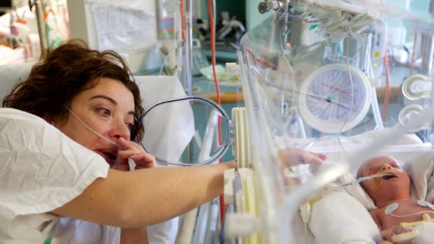 Cristina Cadei sees her baby Lucia for the first time.