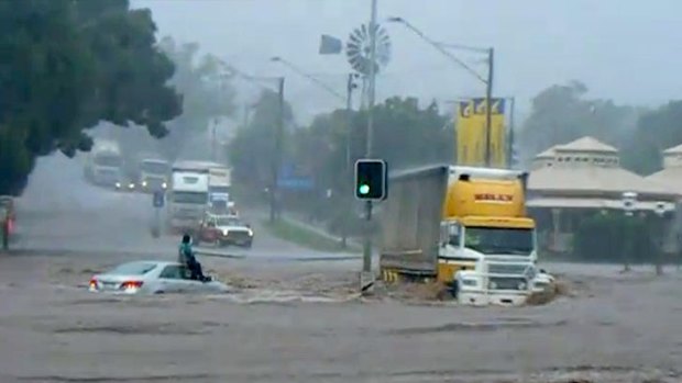 A truck driver rescues a motorist at the corner of James and Kitchener streets in Toowoomba, where Donna and Jordan Rice died.