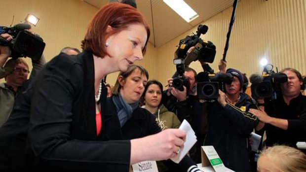 Julia Gillard cast her vote, with the assistance of Nicola Roxon's daughter Rebecca, at Seabrook in Melbourne's west.