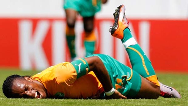 Agony ... Didier Drogba was injured in a World Cup warm-up match.