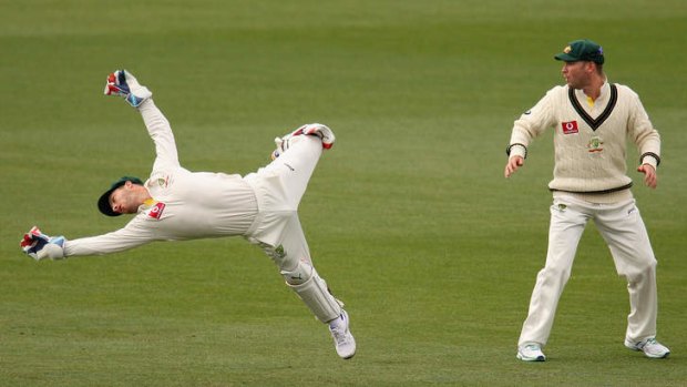 Full stretch ... Matt Wade dives for the ball during day four of the first Test between Australia and Sri Lanka.