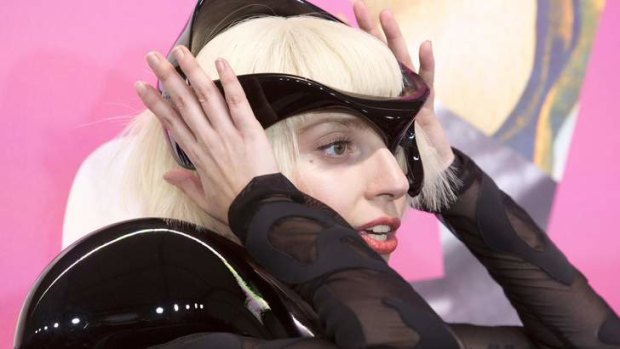 Lady Gaga goes to great lengths to get attention for her new album <i>Artpop</i>.